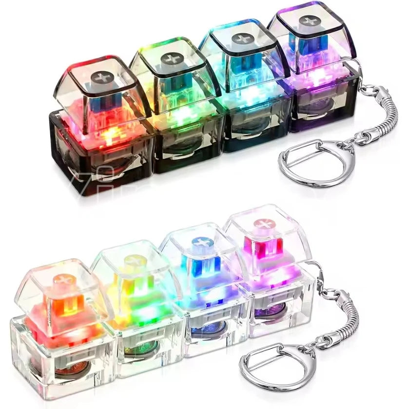 A set of colorful LED macaron keyboard fidget toys packaged as a keychain with various light patterns.