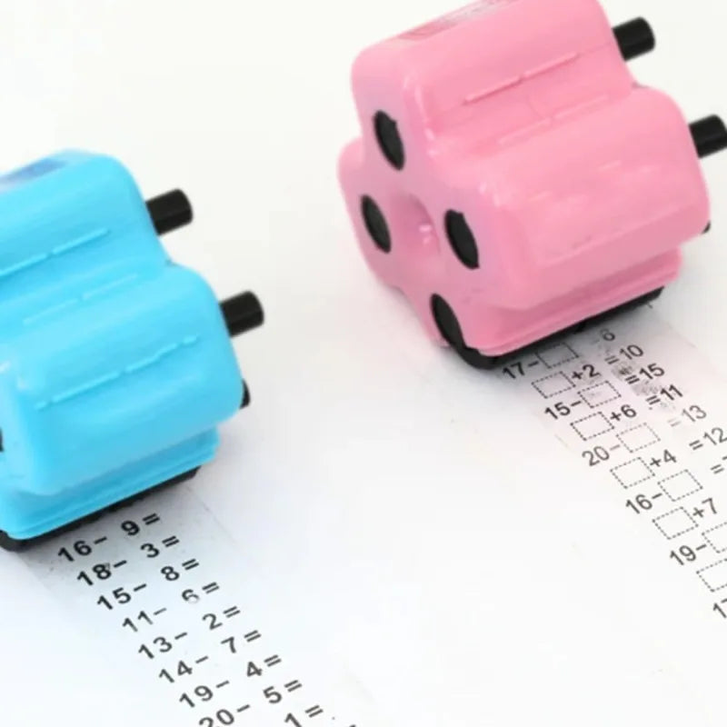 Two pink and blue roller stamps for math practice with numbered grids showing addition subtraction multiplication and divisio