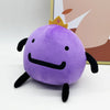 A cute purple plush doll with black features and a gold crown is shown against a light background.