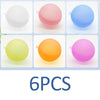 Six reusable splash water balloons in various colors including white, pink, blue, yellow, orange, and purple.