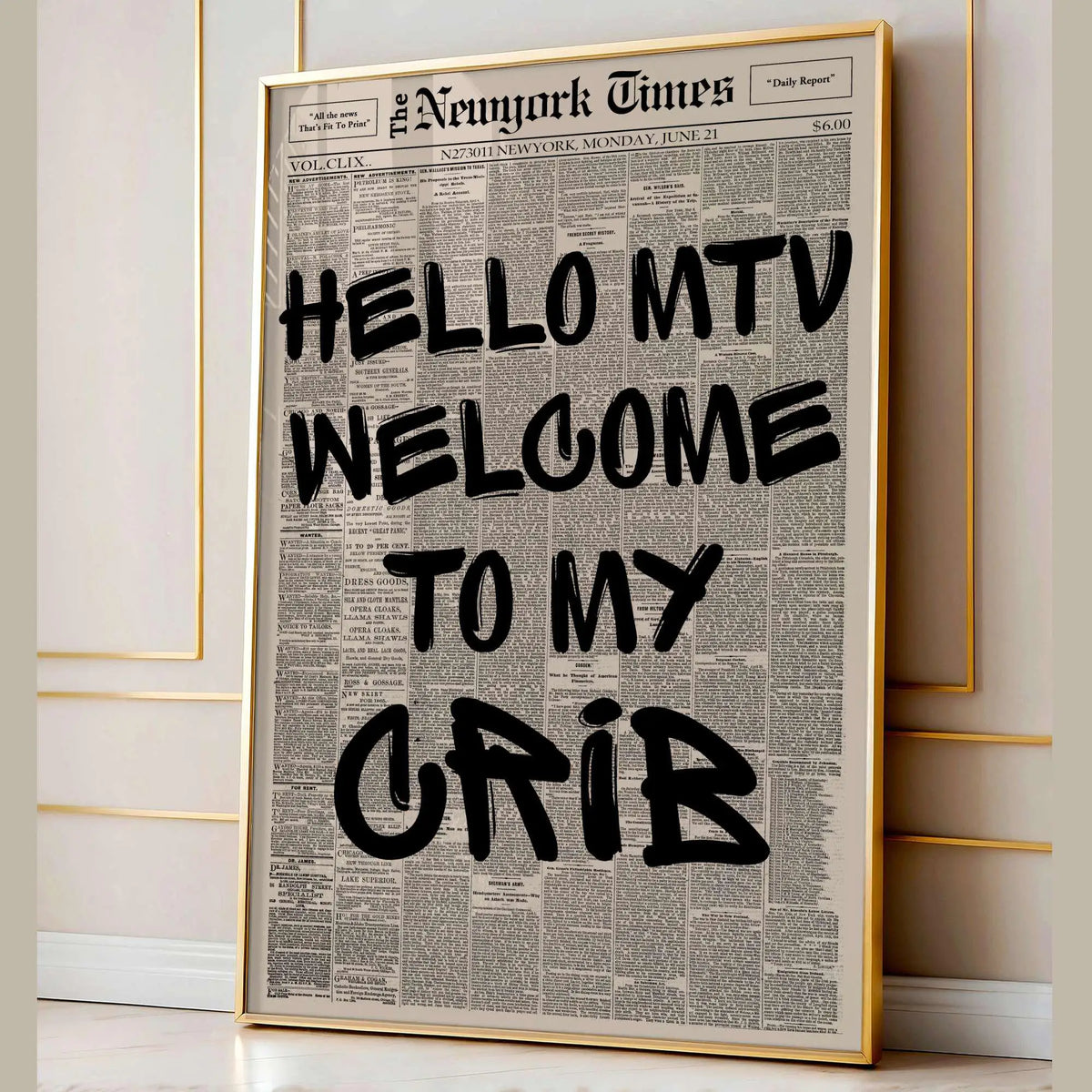 A framed print featuring a newspaper-style layout with the large text HELLO MTV WELCOME TO MY GRIB