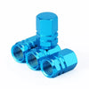 A set of four bright blue aluminum alloy wheel tire valve caps with a hexagon design.