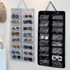 A black felt eyewear organizer with multiple slots for storing and hanging sunglasses and eyeglasses.