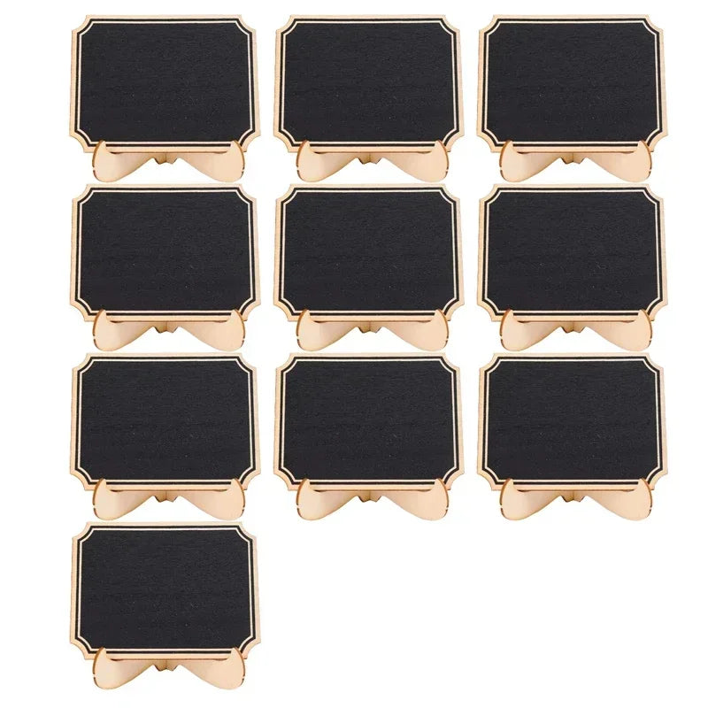 A set of twelve mini wooden chalkboard signs with gold accents arranged in a grid.