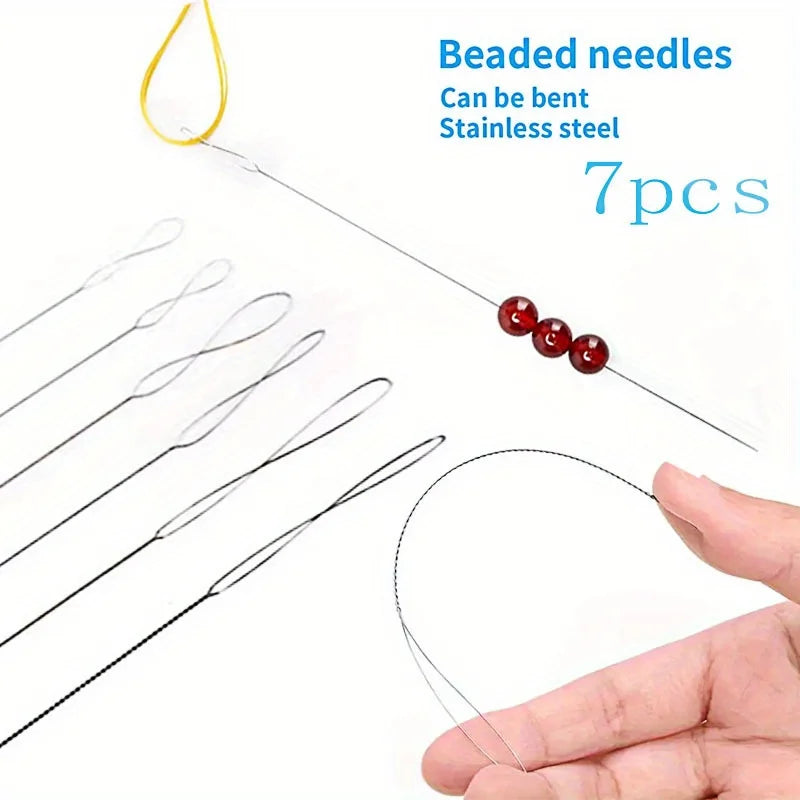 A set of seven beaded needles made of stainless steel are shown next to a hand demonstrating their flexibility.