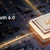 A close-up of a Bluetooth 6.0 chip resting on a dark circuit board with glowing golden lines, illustrating faster and stable 