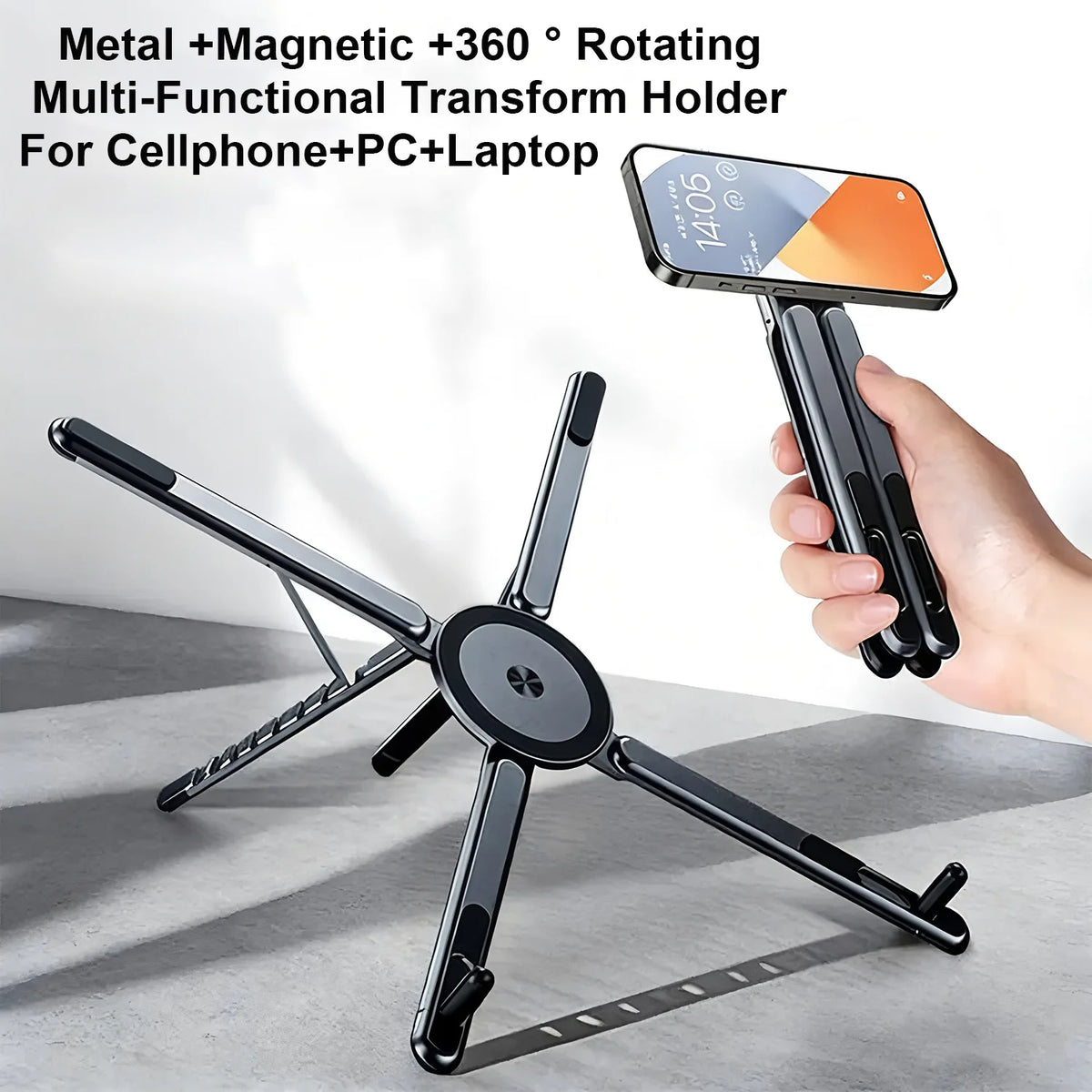 A black magnetic multi-functional transform holder for a cellphone, PC, or laptop is shown in use.