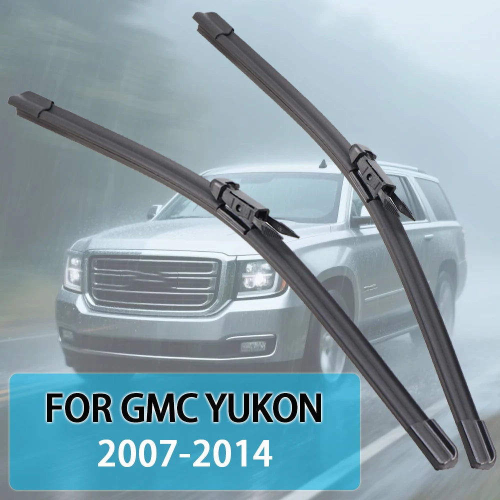 A pair of black windshield wiper blades for a GMC Yukon, shown against a blurred background.