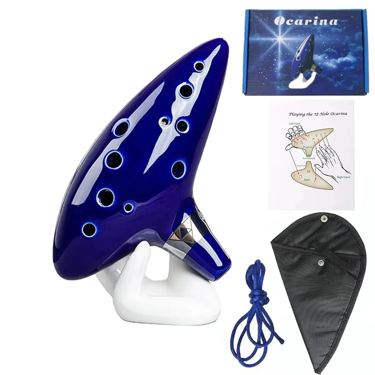 A blue ceramic ocarina with a silver mouthpiece and a music book displayed next to a black storage bag.