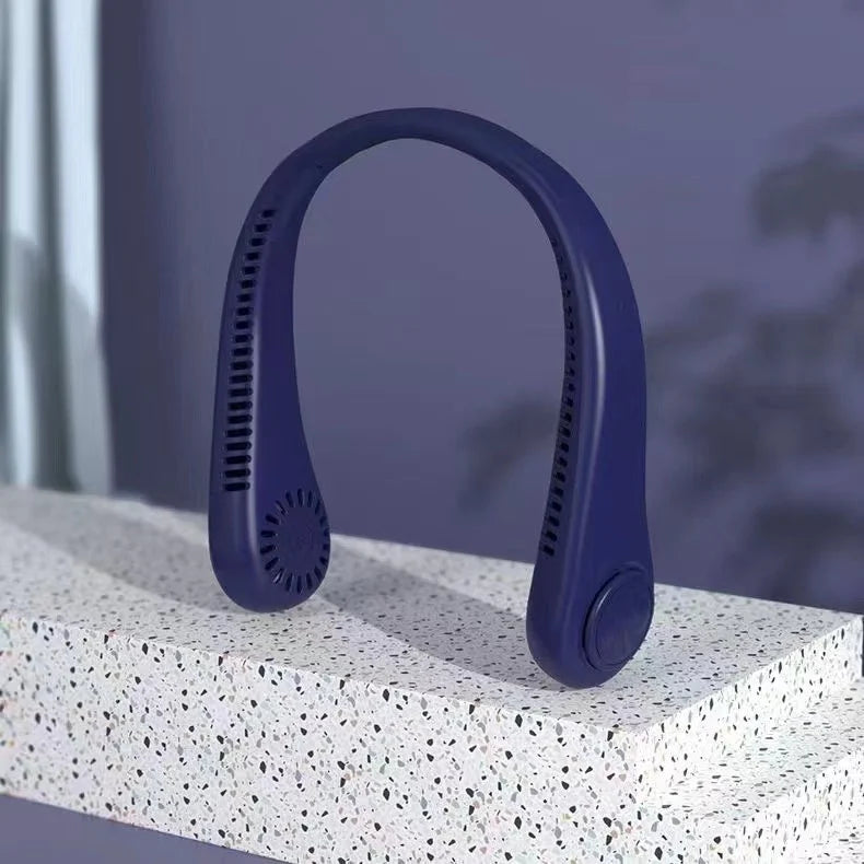 A purple hands-free bladeless neck fan with a digital display is shown resting on a white textured surface.
