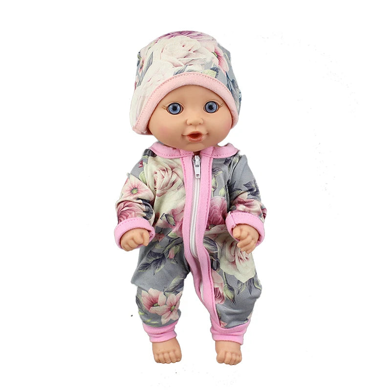 A baby doll wearing a floral print jumpsuit and matching hat.