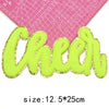 Lime green chenille letter patch spelling Cheer on a pink ruler background