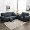 A dark gray silky soft stretchable sofa cover for pet owners displayed on a modern living room floor.