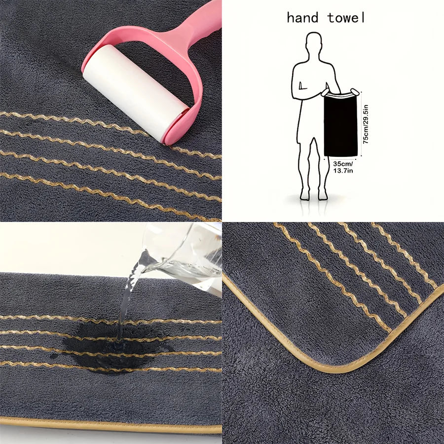 A hand towel set featuring gold stripes on dark gray coral fleece fabric.