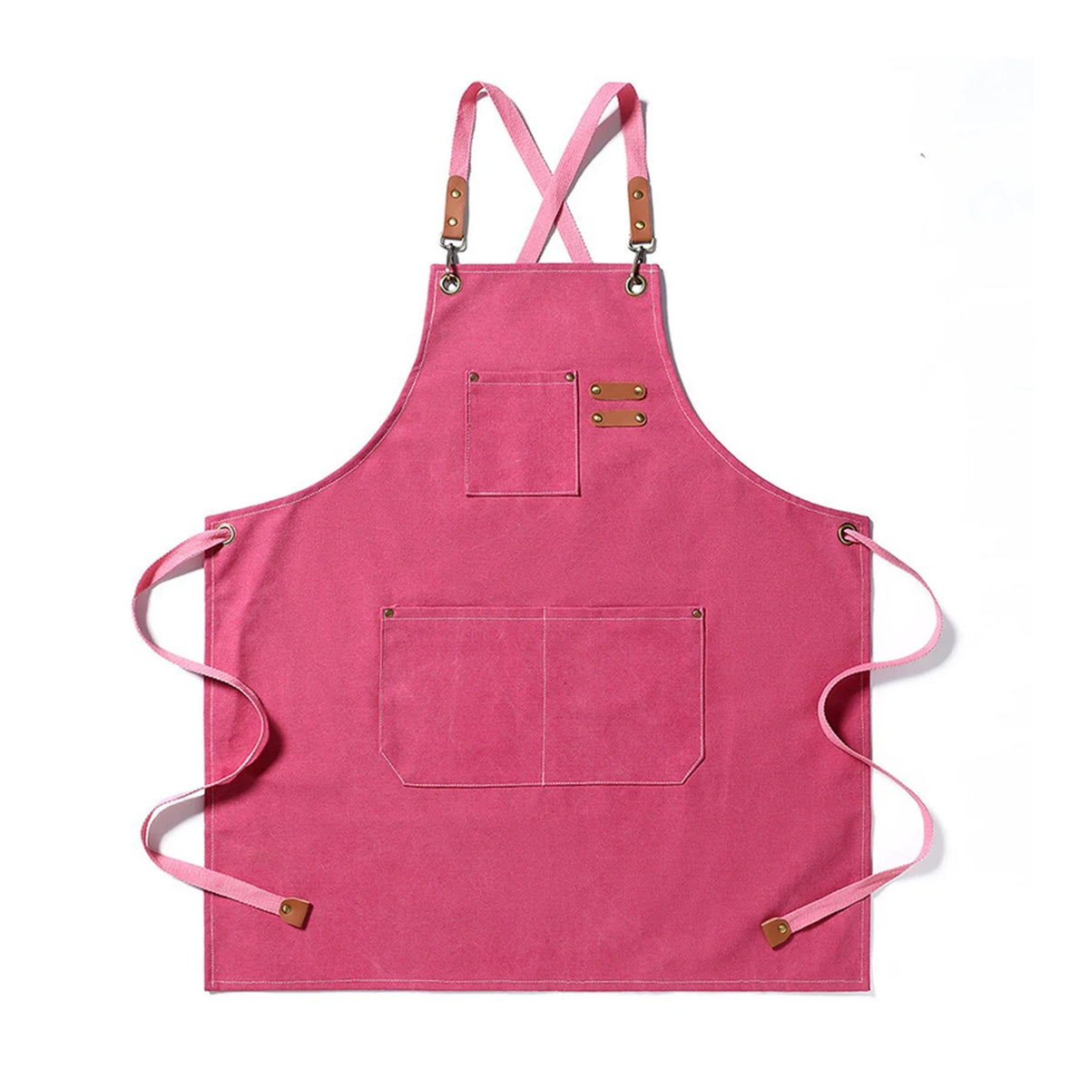 A bright pink canvas apron with straps and two front pockets.
