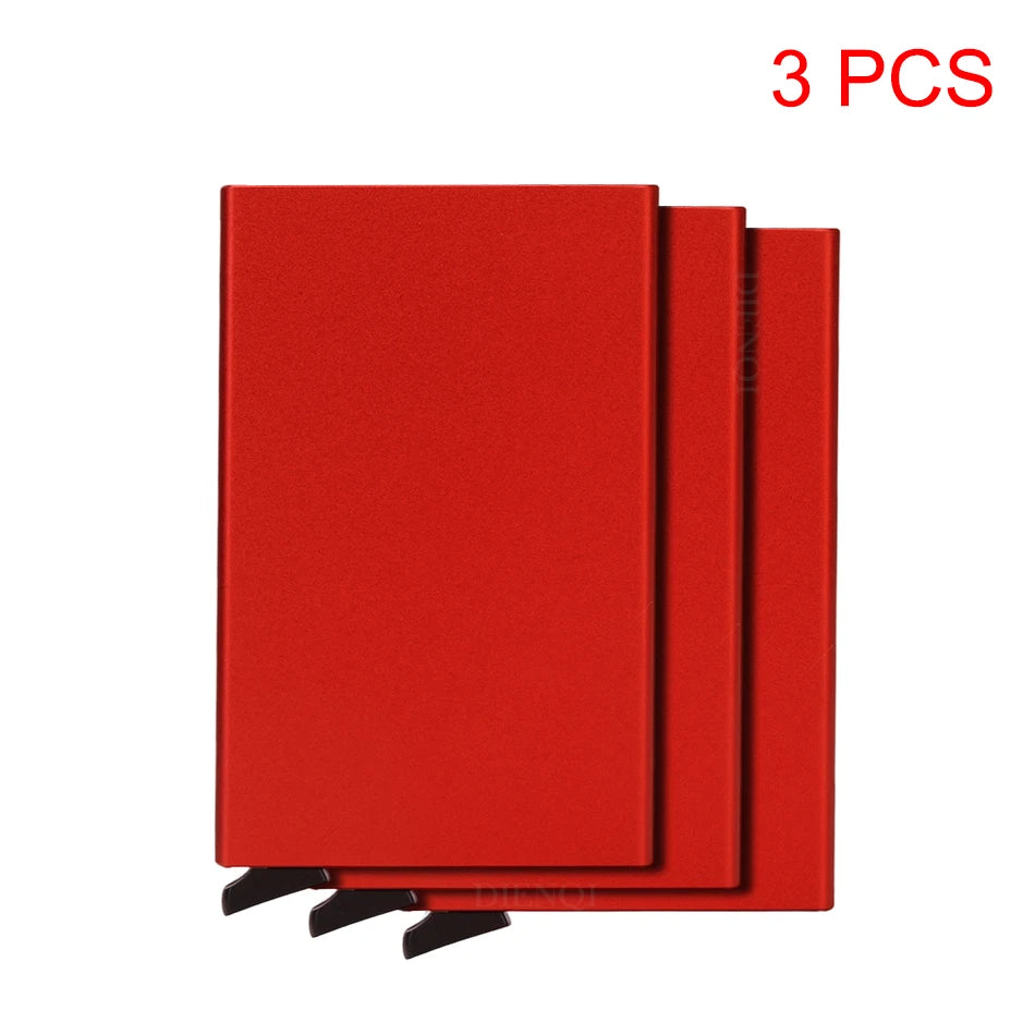 Three red slim metal RFID blocking card holders with a pop-up design.