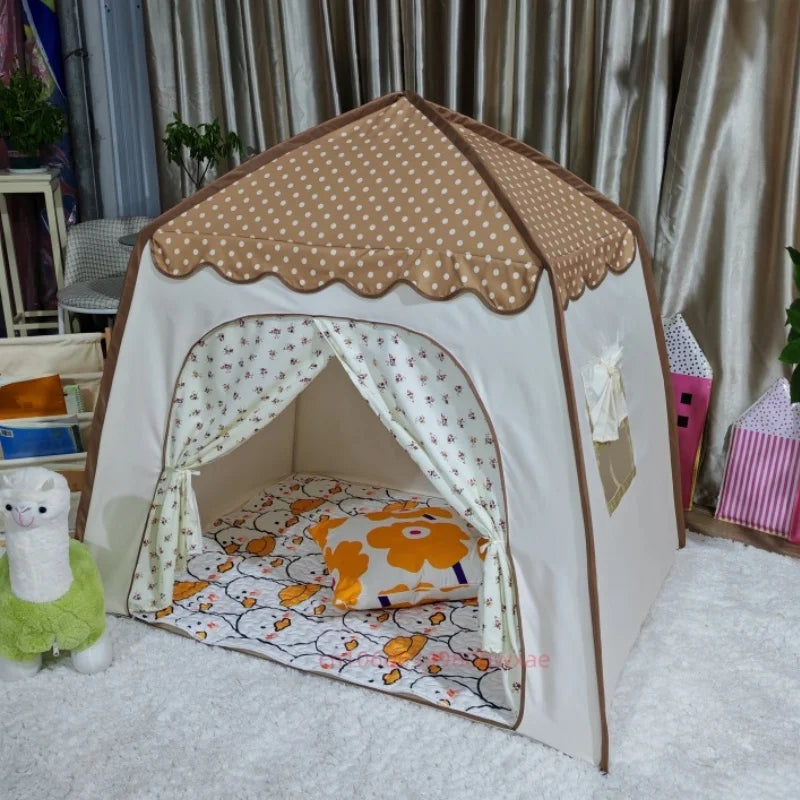 A beige teepee play tent with a brown roof and floral patterned fabric inside.