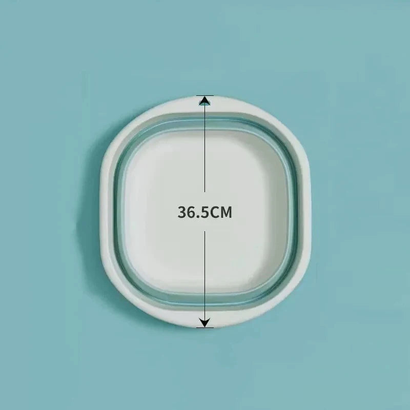 A white plastic wash basin with a 36.5cm diameter is shown against a light blue background.