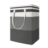 A rectangular laundry hamper with a striped gray and white design and fabric handles.