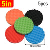A set of five colored foam polishing pads for car detailing, including orange, green, red, black, and blue.