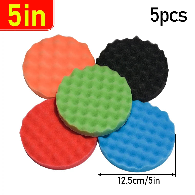 A set of five colored foam polishing pads for car detailing, including orange, green, red, black, and blue.