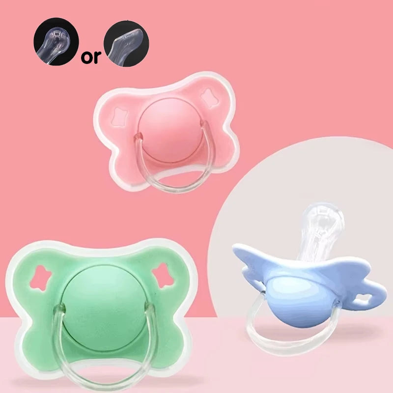 Silicone baby pacifiers in pink and green colors shown with a protective cover.