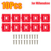 Ten red universal wall-mount battery holders and twelve small screws for power tool batteries.