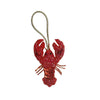 Handcrafted rhinestone bag charm featuring a sequin octopus and turtle pendant keychain.