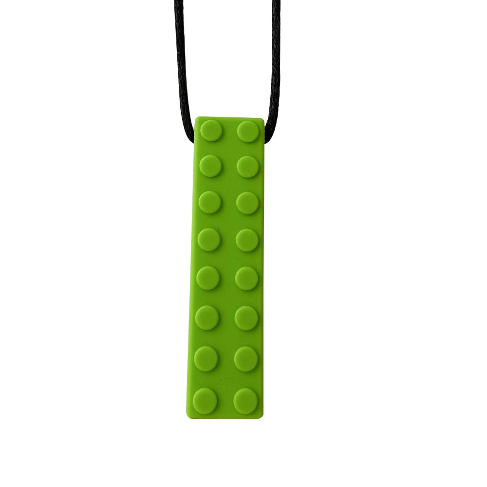 A bright lime green silicone sensory chew necklace pendant with a textured, bumpy surface.
