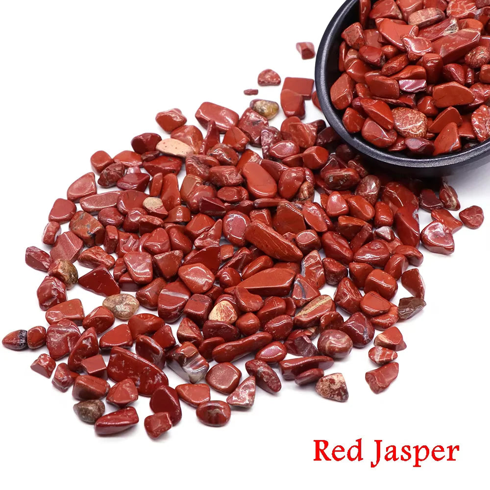 A pile of reddish-brown tumbled jasper crystal stone chips.