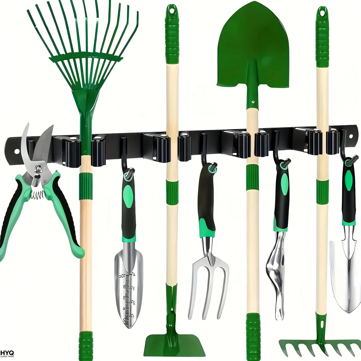 A heavy-duty wall-mounted tool rack displaying a green broom, shovel, and various hand tools with hooks.