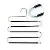 A silver and black S-shaped pants hanger with a non-slip storage rack.
