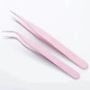 A pair of pink macaron color craft tweezers for use in scrapbooking and journaling