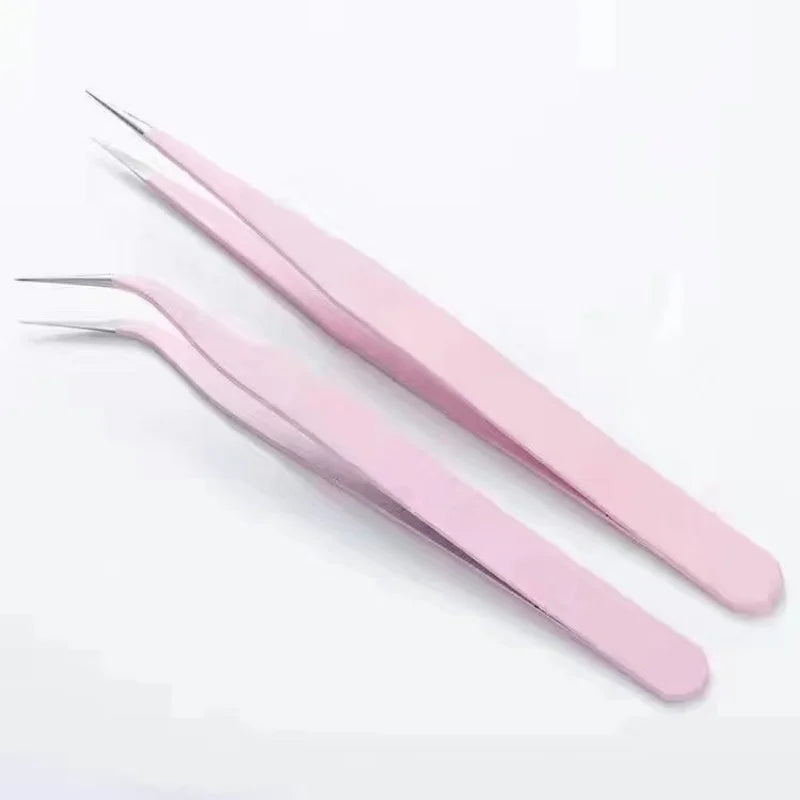 A pair of pink macaron color craft tweezers for use in scrapbooking and journaling