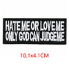 Black embroidered iron-on letter patch with white text that reads Hate Me or Love Me Only God Can Judge Me