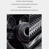 Close-up view of black carbon fiber leather upholstery material used in a supercar interior.