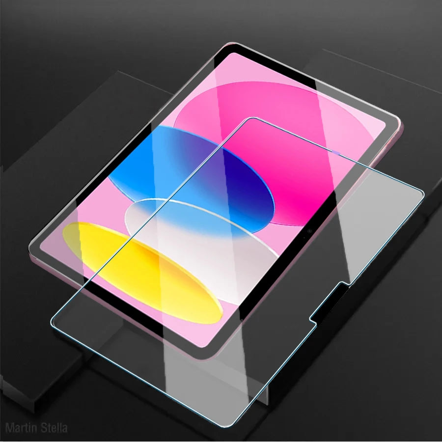 A clear tempered glass screen protector is shown on an iPad, displaying a vibrant gradient of pink, blue, and yellow colors.