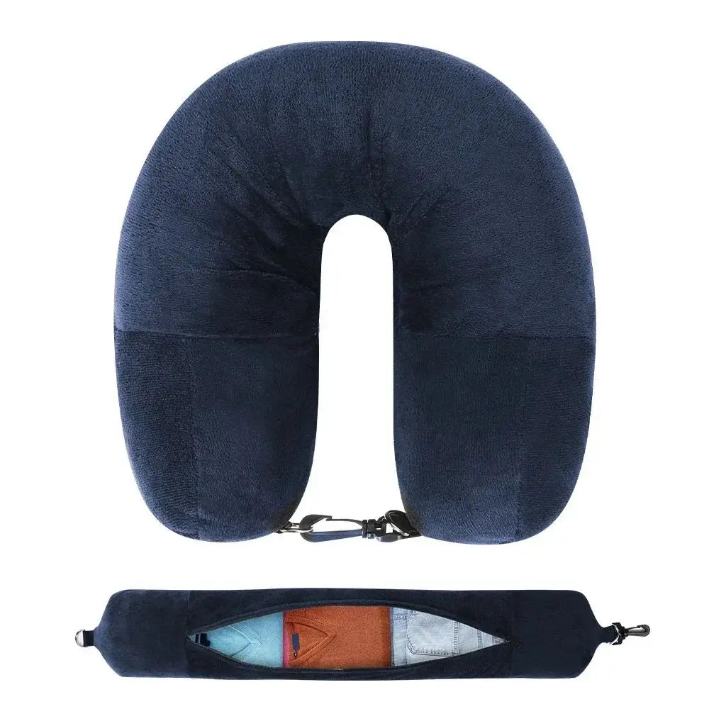Dark blue U-shaped travel neck pillow with a velvet cover and attached storage bag