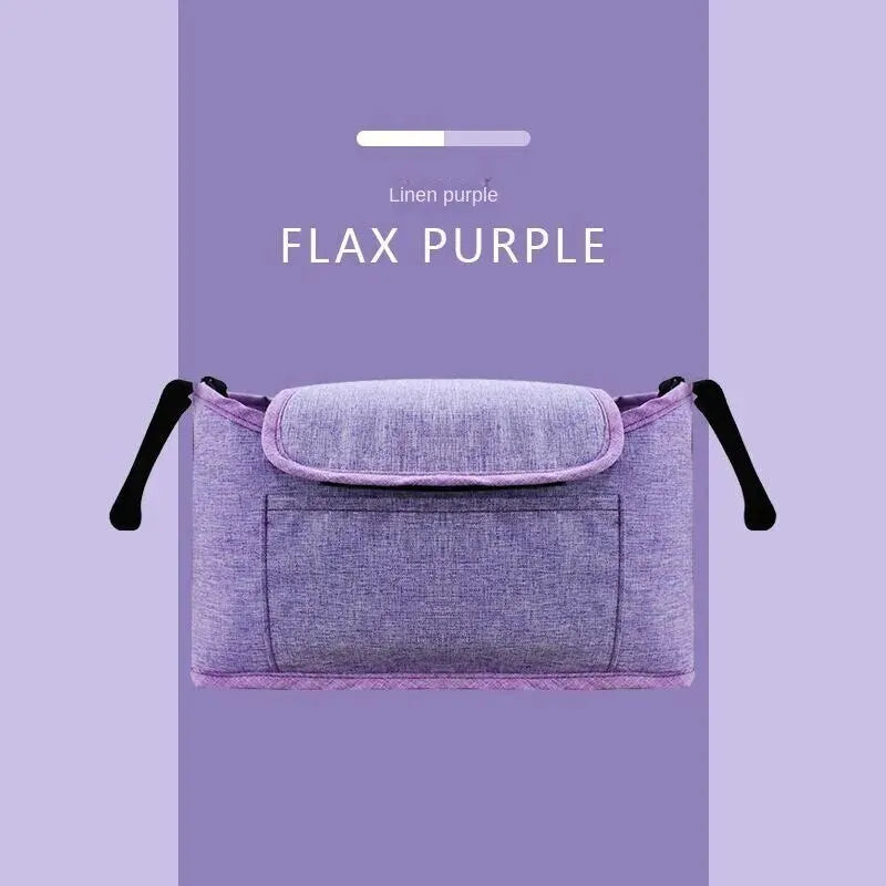 A purple flax purple fabric organizer bag for a stroller, featuring a cup holder.