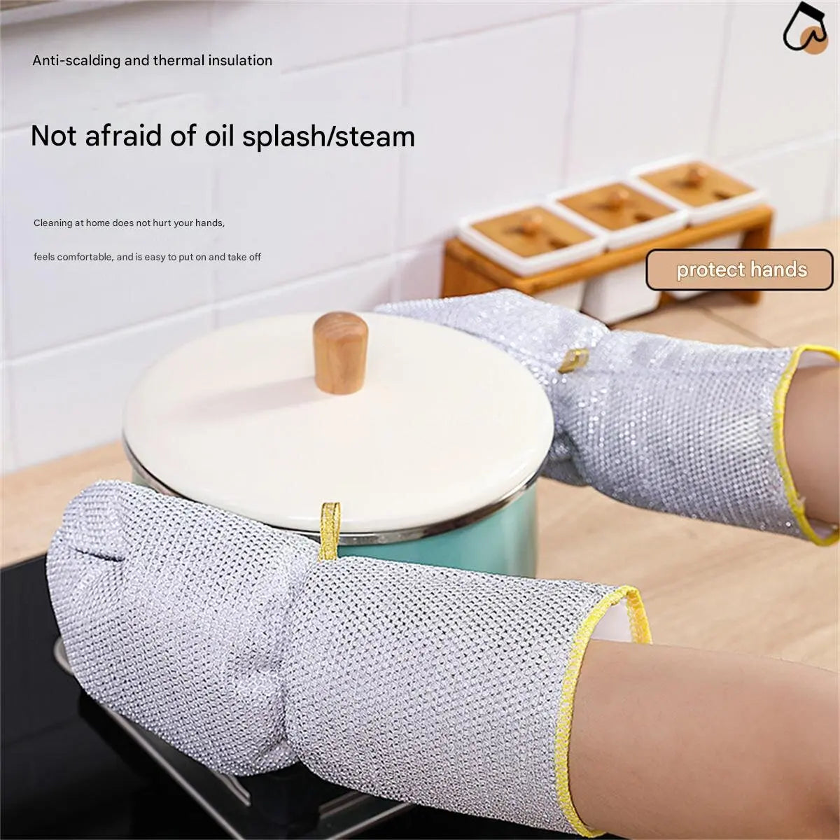 A pair of silver steel-wire dishwashing gloves with extended cuffs are shown being worn on a hand.