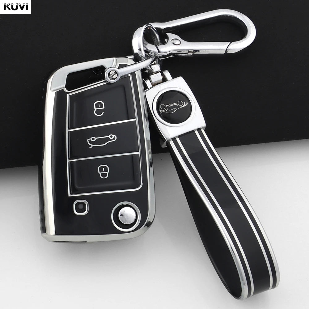 A silver car key cover with a black grip and metal clip, designed for VW, SEAT, and Skoda models.