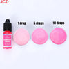 A set of fluorescent pink liquid candle dye in various drop quantities, including 1, 5, and 10 drops.