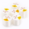 Rolls of transparent elastic cord for jewelry making and beading with various diameters labeled on the packaging