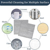 A set of double-sided kitchen cleaning cloths is shown demonstrating powerful cleaning on ceramic, steel, wood, and wall surf