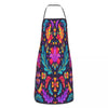 A vibrant Mexican floral art apron featuring colorful flowers and leaves in purple, pink, yellow, and blue.