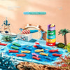 A colorful fabric fishing game featuring various fish and sea creatures on a blue mat for toddlers.
