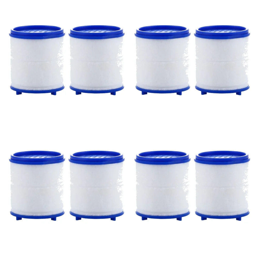 Four white rotating water filters with blue caps and splash guards.