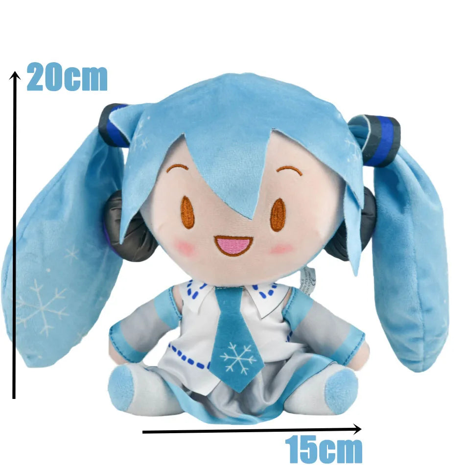 A soft blue Hatsune Miku plush doll figure with large ears and a stylized outfit.