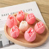 Pink silicone tulip molds used for making candles and soap
