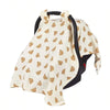 A beige breathable stroller cover featuring a pattern of small brown leaves and a black handle.